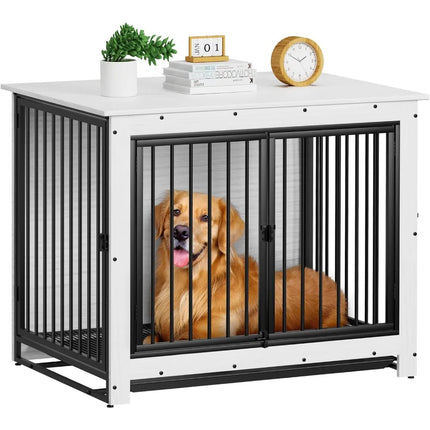 Dog in a large metal crate with a white frame, furniture crate