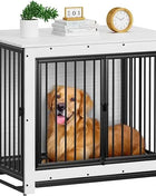 Dog in a black metal crate with a white top, surrounded by books and a plant on a white background